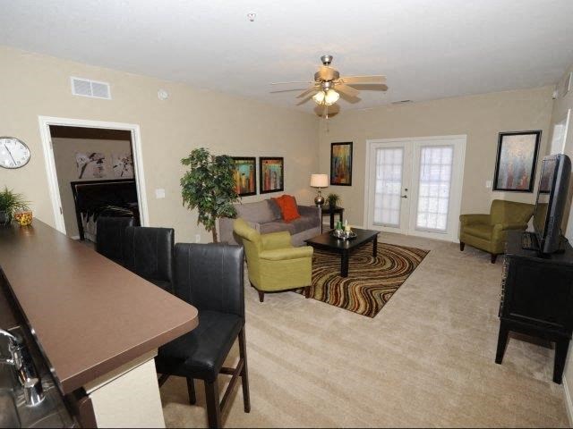 a living room with a couch and a table