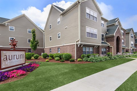 A residential area with a sign that says "aurum".
