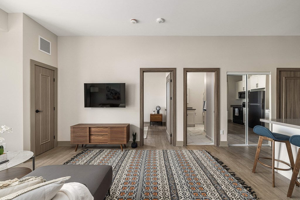 a bedroom with a bed and a chair in a room at 2274 Princess St., Ontario