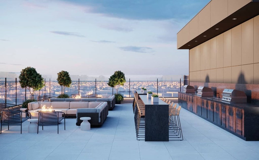 a rendering of the rooftop bar and terrace at the envoy hotel in san francisco
