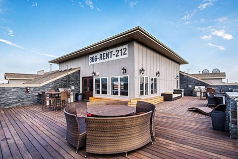the patio of the bbq grill on the roof of the building