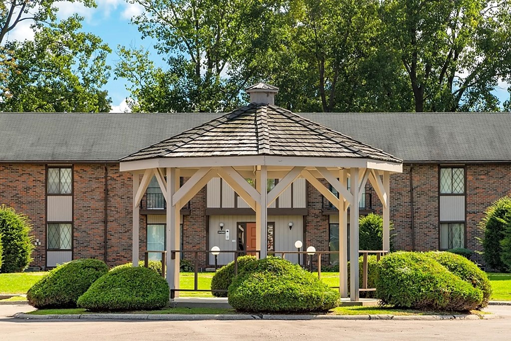 a gazebo in front of a building