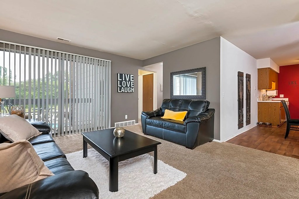 a living room with a couch and a coffee table
