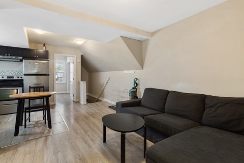 a living room with a couch and a table