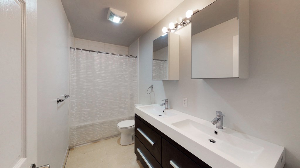 a bathroom with a sink and a toilet