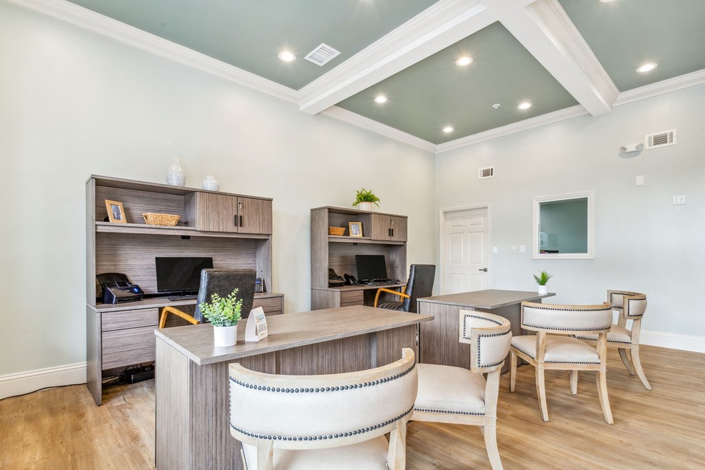 a living room with a desk and chairs at Reserve at Temple Terrace, Temple Terrace, 33637
