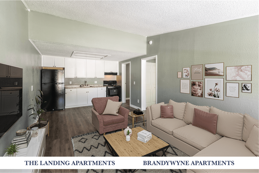 A living room with a couch, chair, and coffee table.