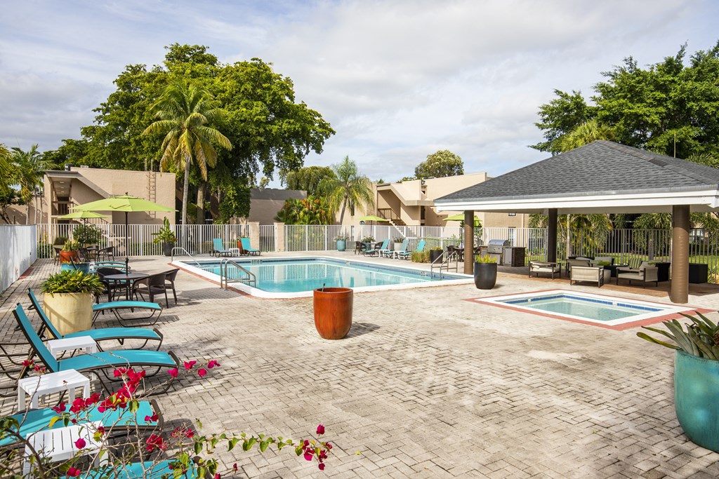 Poolside Relaxing Chairs at DEL ORO APARTMENT HOMES, Plantation, 33313