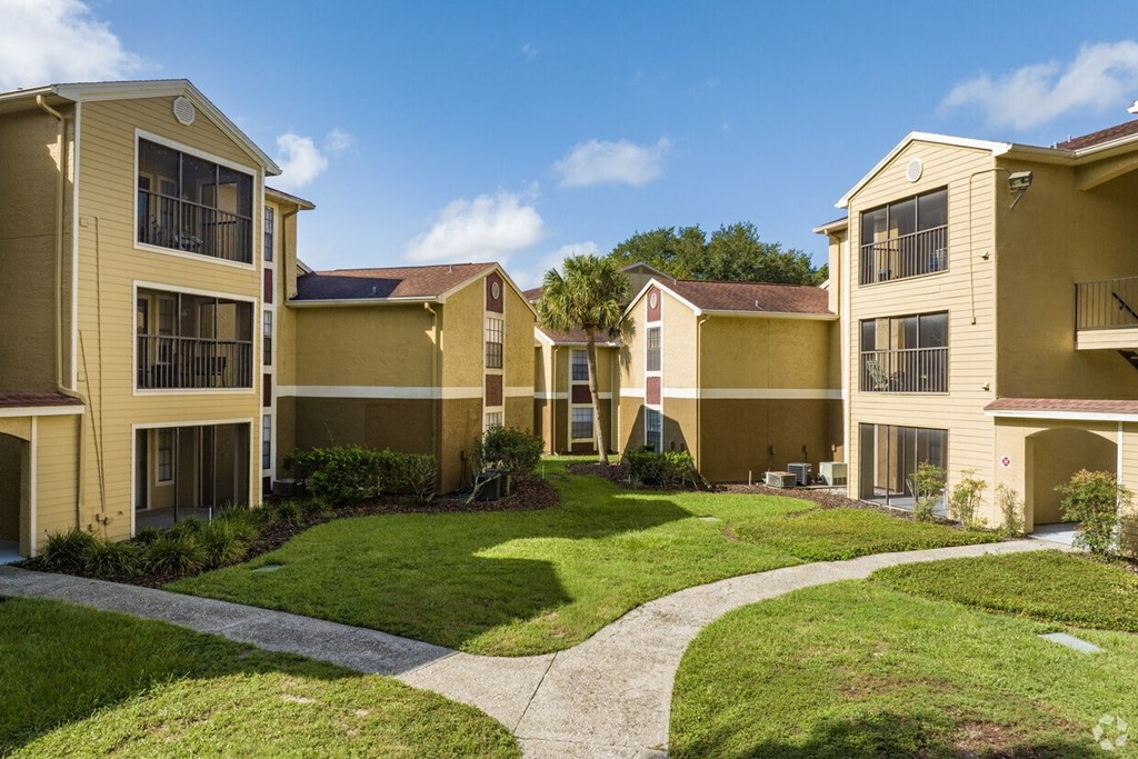 A sunny day at a well-kept apartment complex.