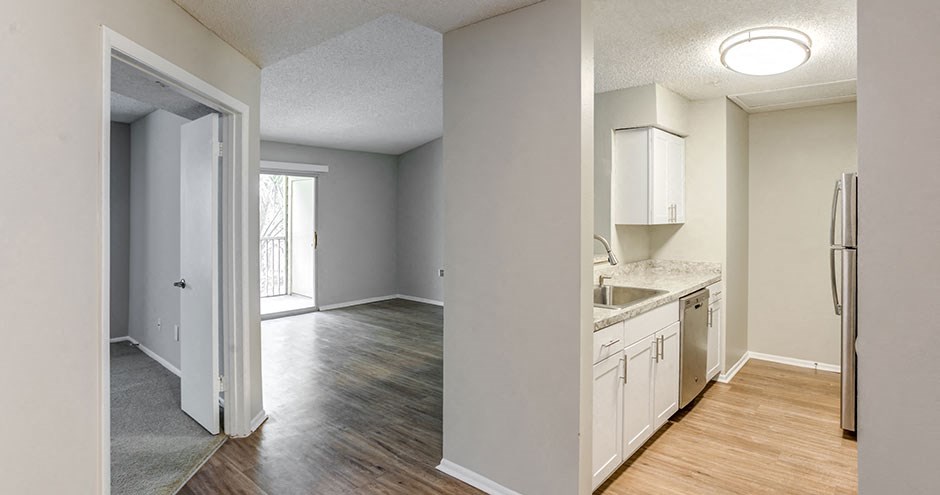 Living Room With Kitchen View at Newport Colony Apartment Homes, Florida, 32707