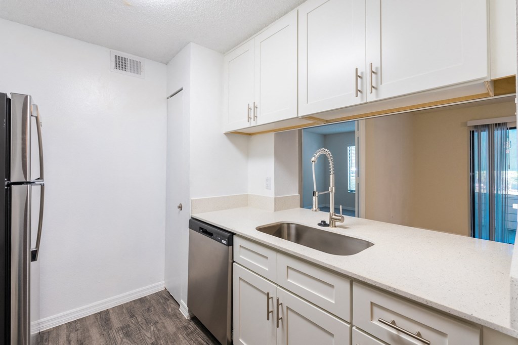 the preserve at ballantyne commons apartment kitchen with stainless steel appliances  at Fisherman's Landing Apartment Homes, Tampa, FL
