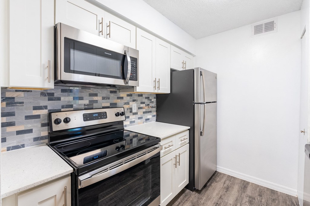 the preserve at ballantyne commons apartment kitchen with stainless steel appliances the preserve at ballantyne commons apartment kitchen with stainless steel appliances at Fisherman's Landing Apartment Homes, Tampa, FL