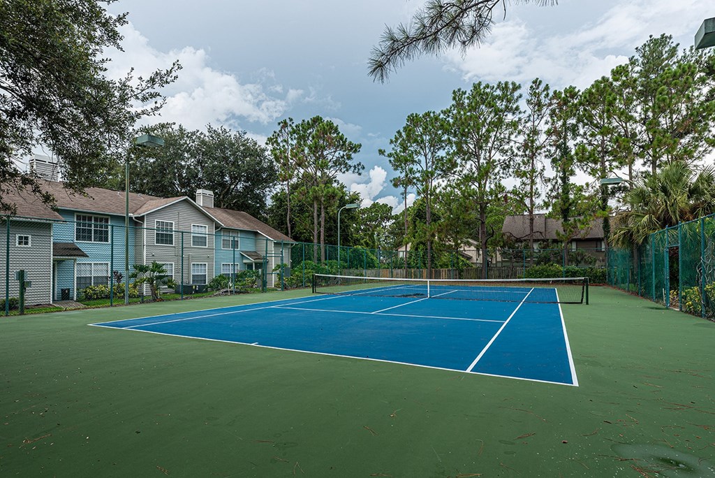 the tennis court at the preserve at ballantyne commons apartments at Madison Oaks Apartment Homes, LLC, Florida, 34684
