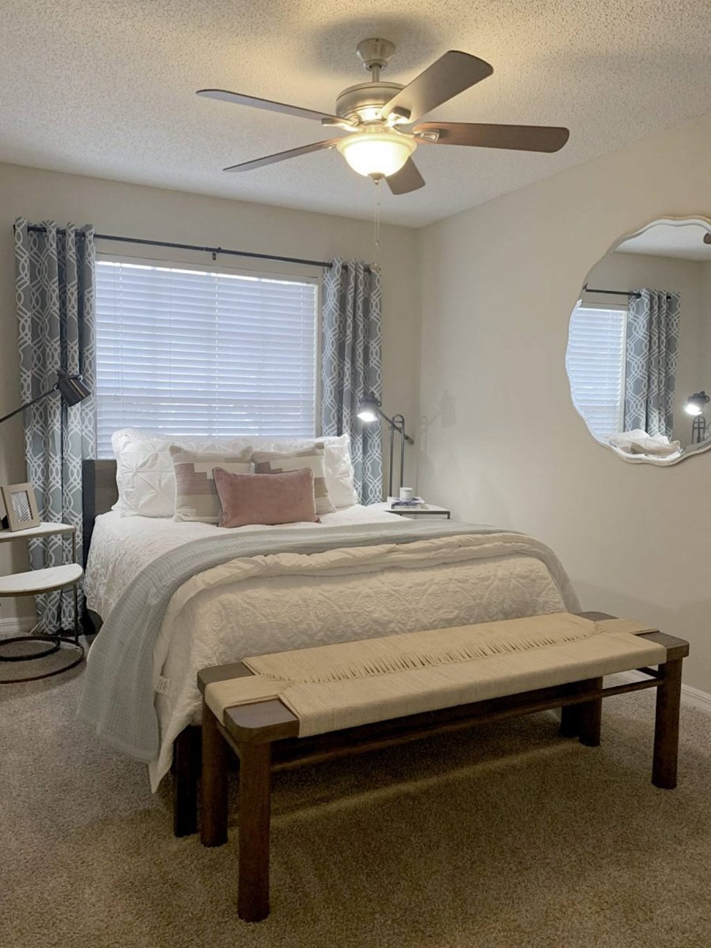a bedroom with a bed and a ceiling fan at Madison Oaks Apartment Homes, LLC, Florida, 34684