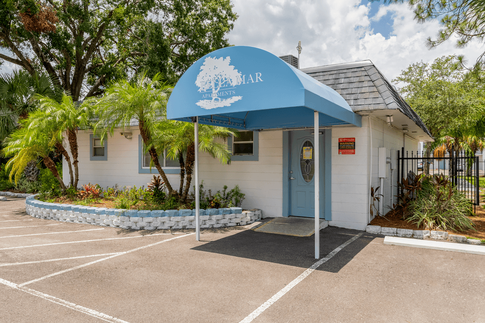 Exterior of leasing office at Bella Mar Apartments