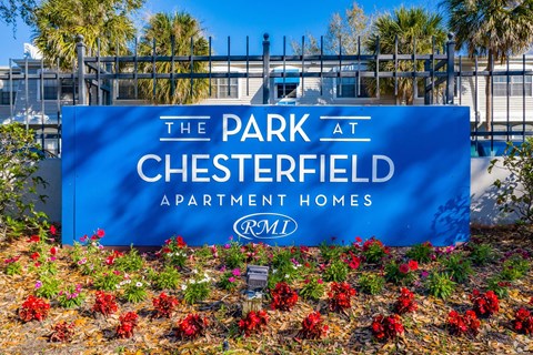 the sign at the park at cresented apartment homes