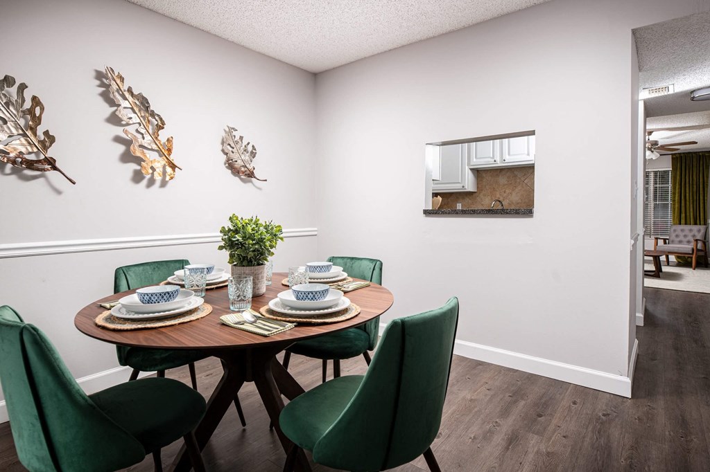 a dining room with a table and chairs  at The Park at Chesterfield Apartment Homes, Tampa, FL, 33617