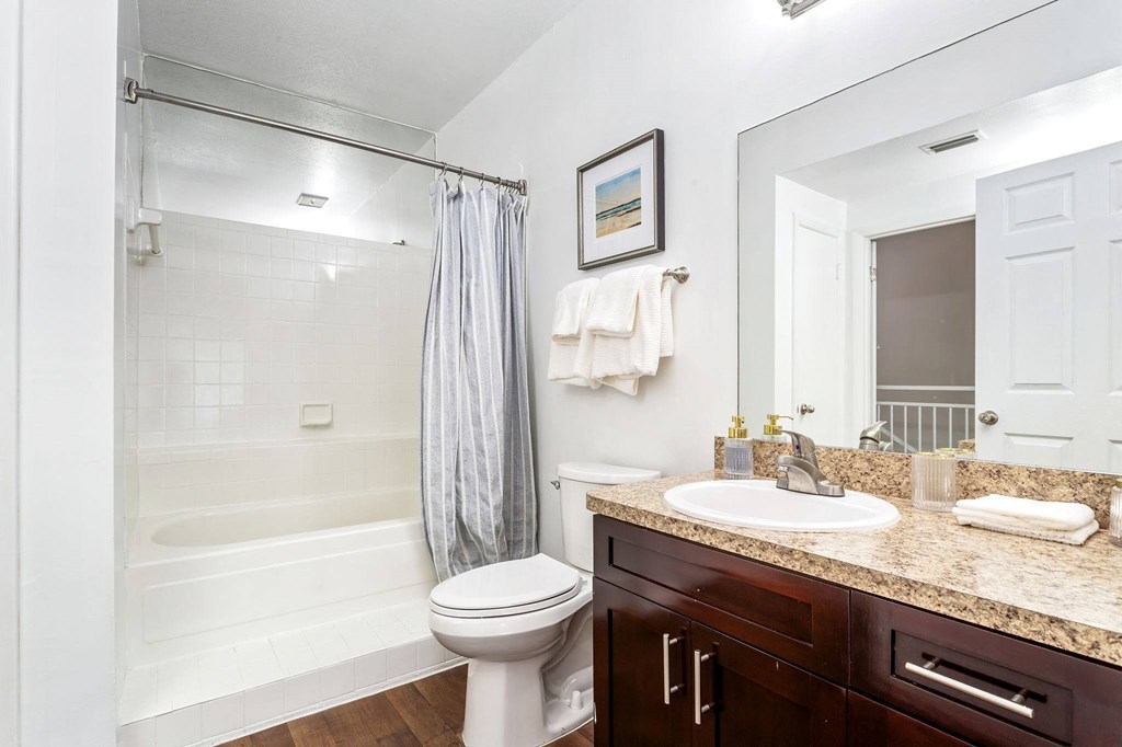 a bathroom with a sink toilet and shower at Waterford Park Apartment Homes, LLC, Lauderhill, FL
