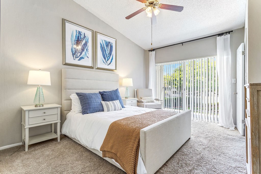 a bedroom with a bed and a ceiling fan at Waterford Park Apartment Homes, LLC, Lauderhill, FL 33319