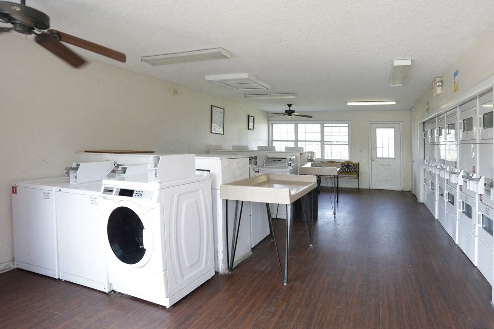 A laundry room with a washer and dryer.
