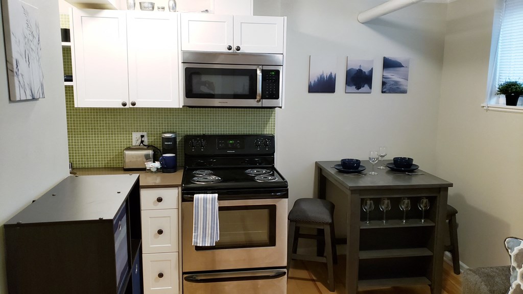 this is a photo of the kitchen in the 1 bedroom clipper floor plan at nant