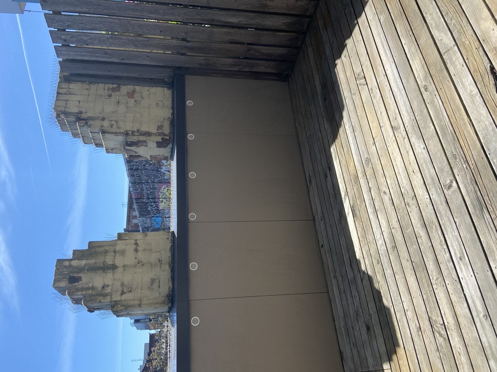 a reflection of a building in the windows of another building