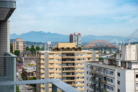 a view of the city of vancouver and the mountains in the background