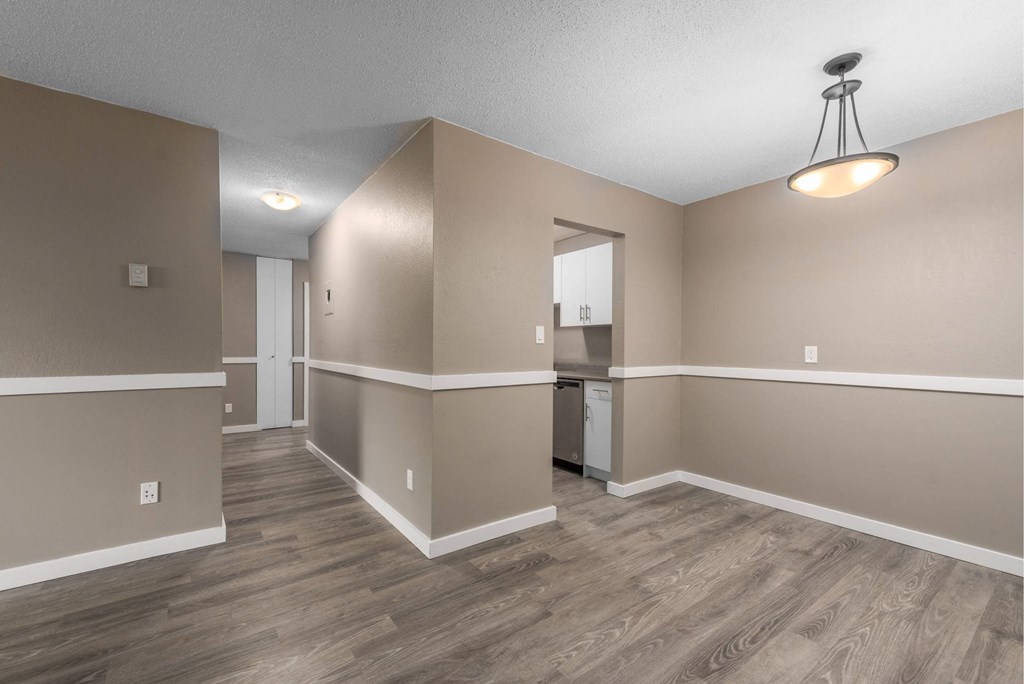 A room with a washer and dryer in it.