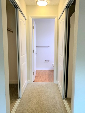 short hallway closet walkway and entrance to bathroom - Photo Gallery 4