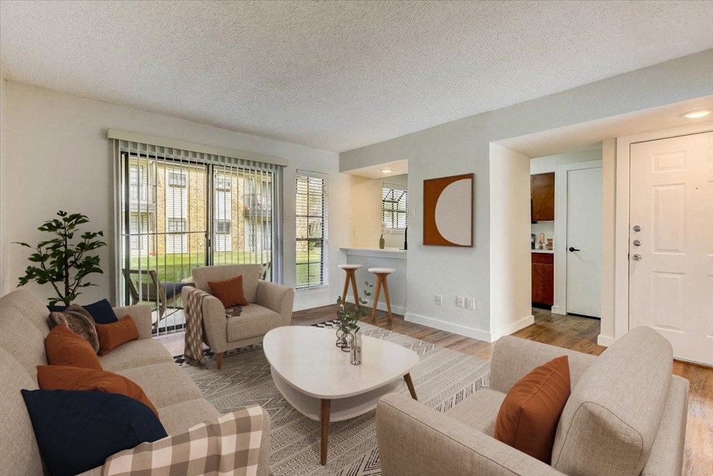 a living room with couches and a table