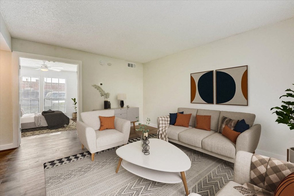 a living room with a couch and a table