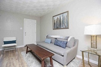 a living room with a couch and a coffee table