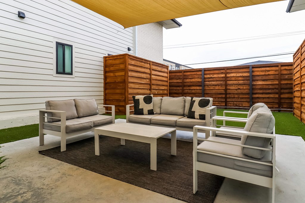 Couch in living room at The Eastern Apartments, Dallas, TX, 75204
