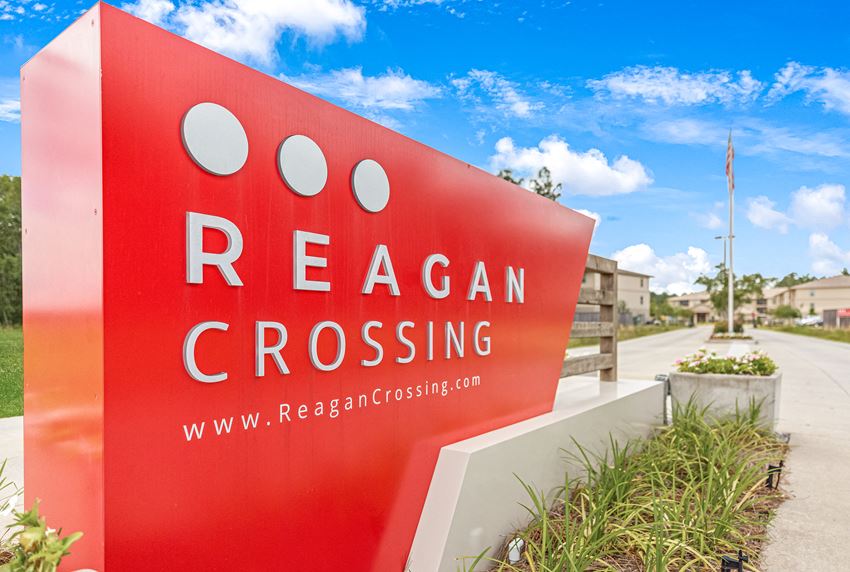Front entrance sign at Reagan Crossing in Covington, LA - Photo Gallery 1