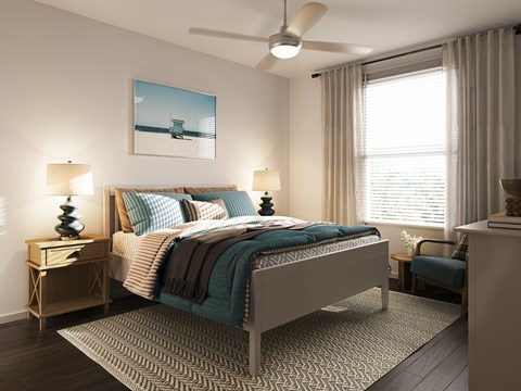 A bedroom with a bed, a chair, and a painting on the wall.