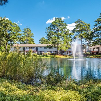 Looking across the stocked fishing pond towards the property at Ascend at Savannah