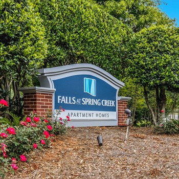 Falls at Spring Creek Apartment Homes property entrance sign in Macon, GA