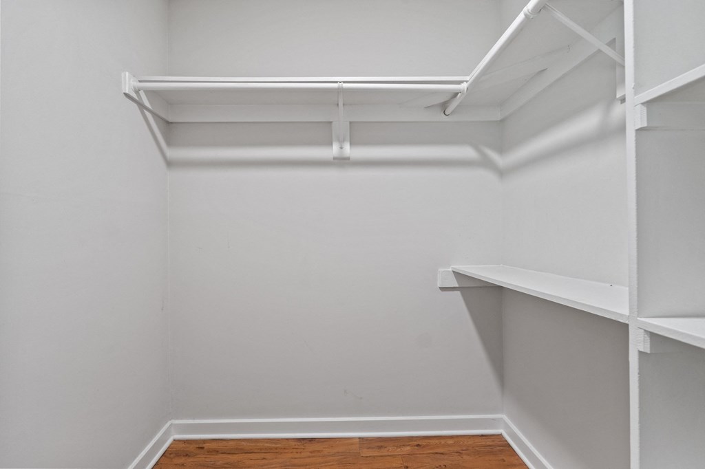 a walk in closet in a 555 waverly unit