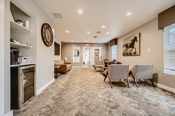 Leasing office interior with coffee bar at Hunt Club in Gaithersburg, MD - Photo Gallery 20