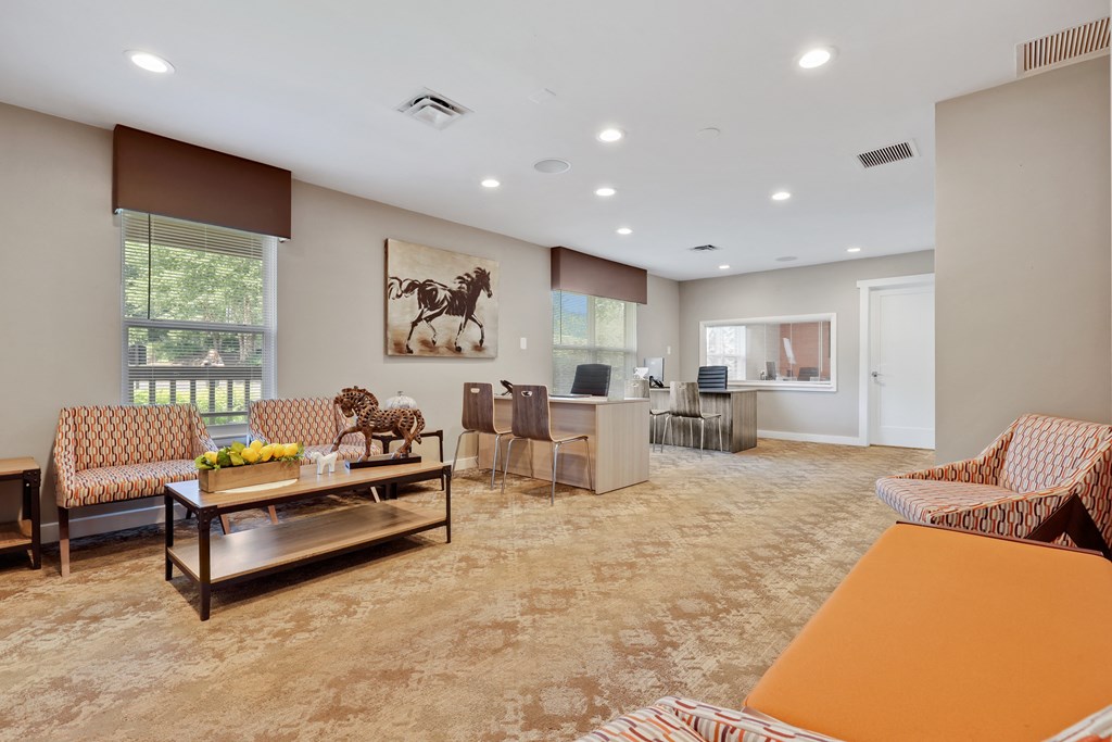 the reserve at bucklin hill clubhouse resident lounge with couches and a coffee table