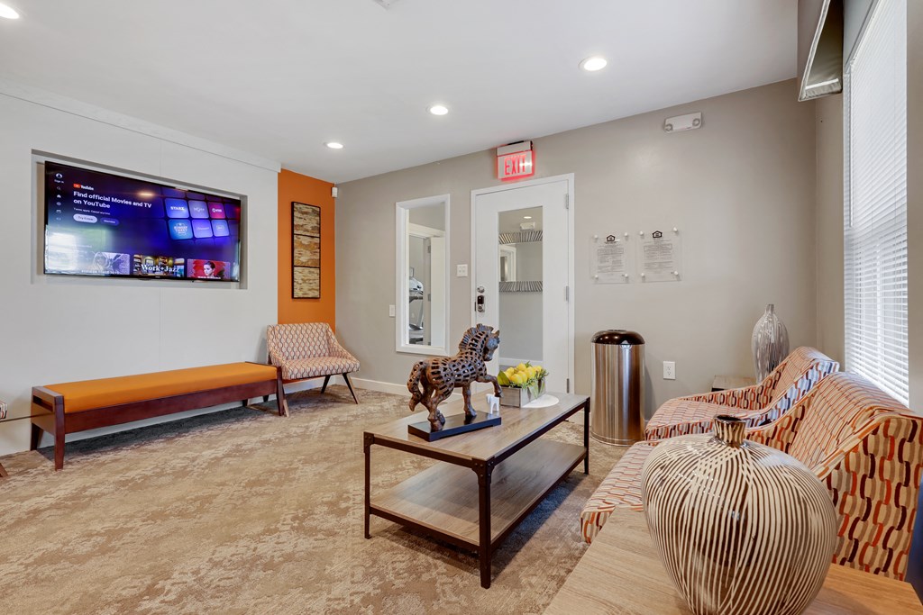 a living room with couches and a coffee table