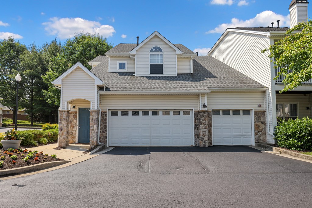 a house with a two car garage