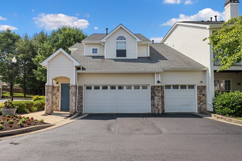 a house with a two car garage