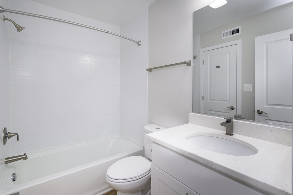 Bathroom with quartz countertops and shower/tub at Windsor Park in Woodbridge, VA