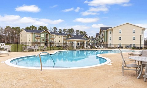 Resort style swimming pool with sundeck at The Maxwell Apartments, Rome, GA