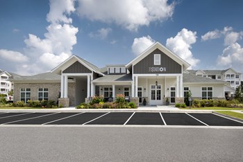 Entrance to the leasing office and resident clubhouse at at the Station at Savannah Quarters in Pooler, GA - Photo Gallery 3