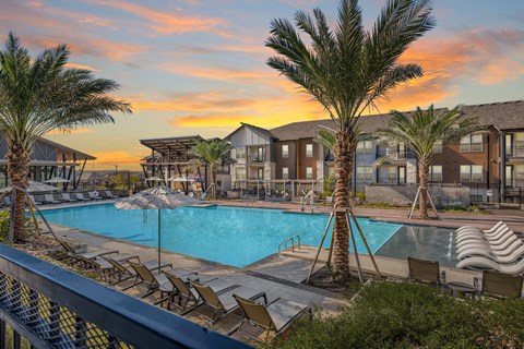 Cypress McKinney Falls resort-style swimming pool with large sundeck at sunset in Austin, TX