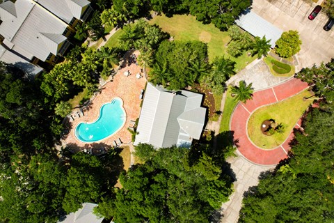 arial view of a house with a swimming pool