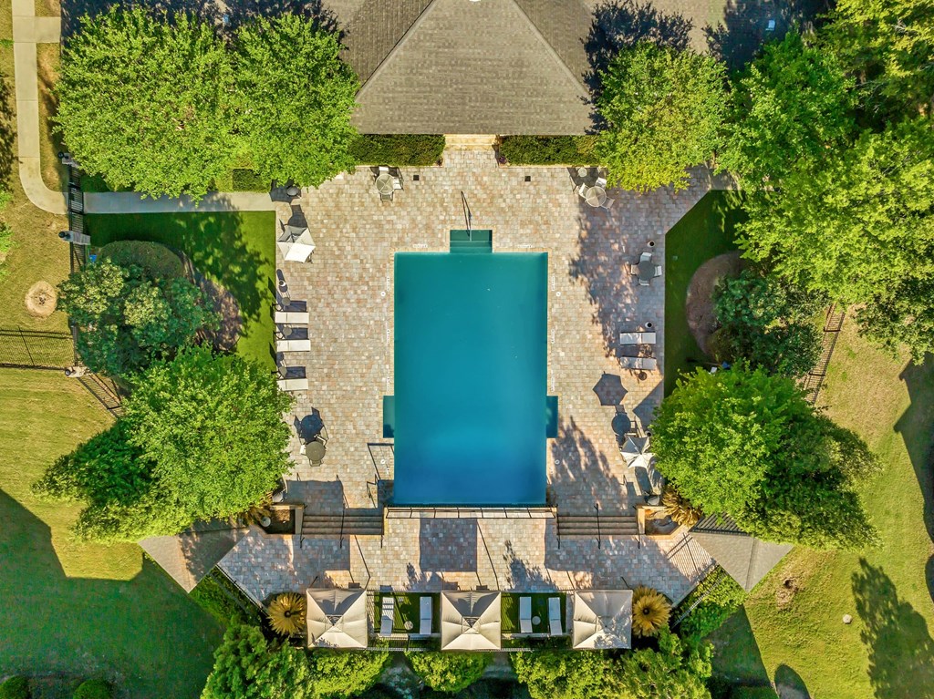 arial view of a house with a pool