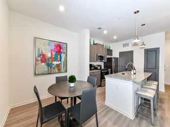 Gorgeous kitchen with dining area and barstools at The Station at Brighton in Grovetown, GA